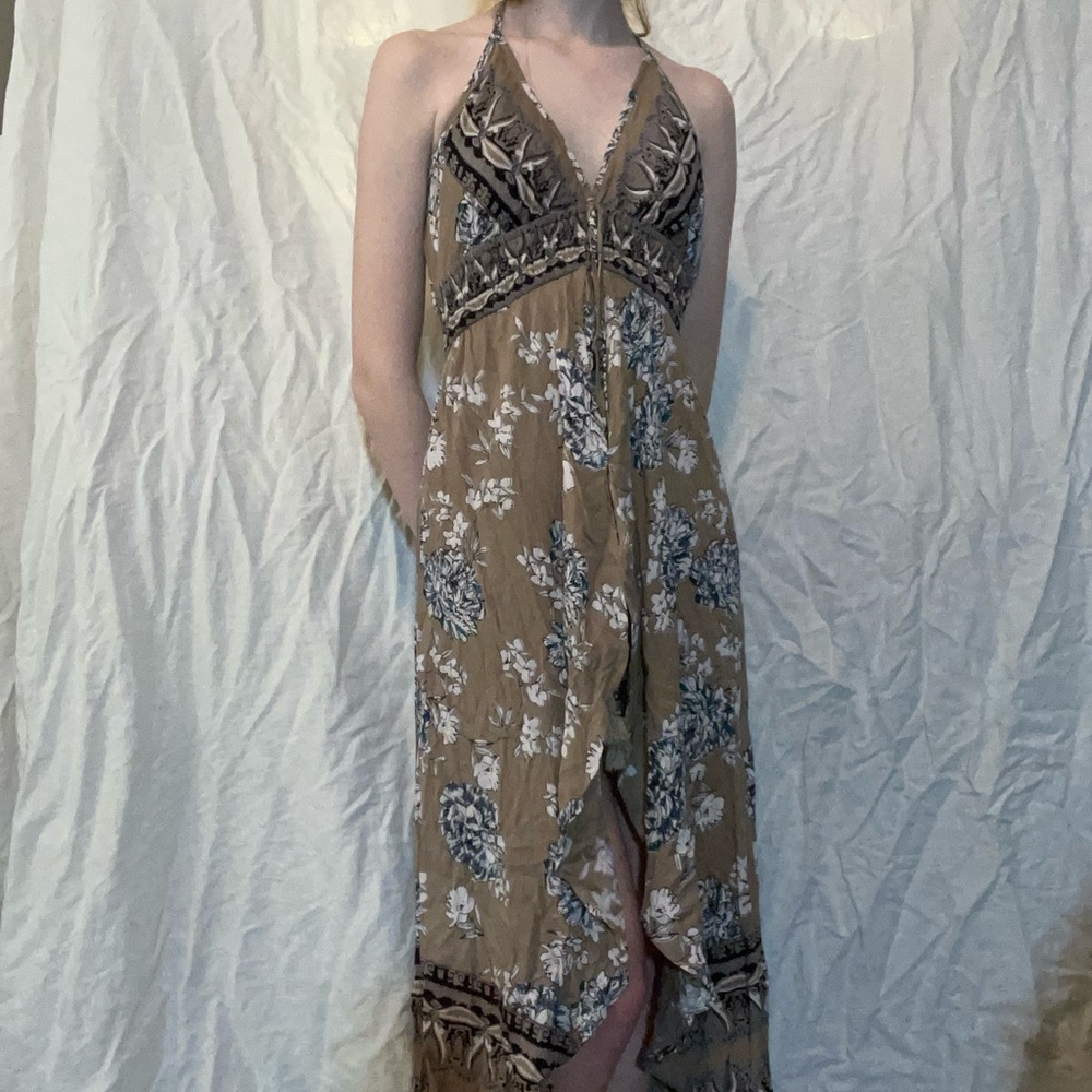 NWT. Size small romper from Angie.